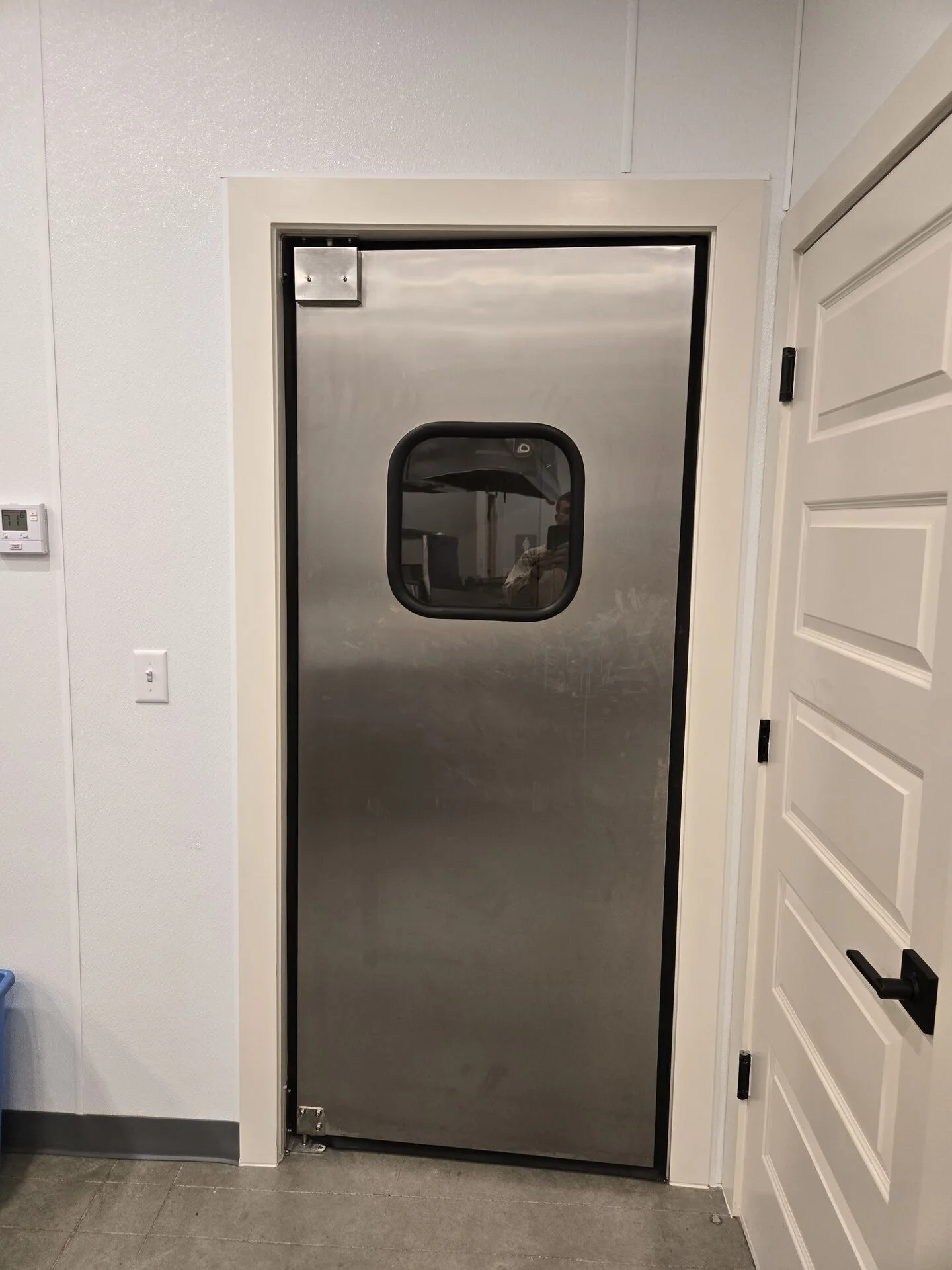 Commercial kitchen exhaust hood system over cooking line