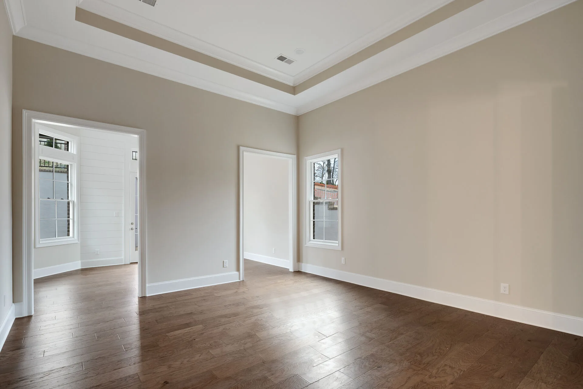 Dining area with wood beam ceiling